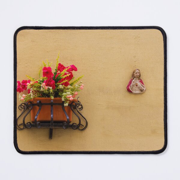 Item preview, Window Planter With Red Flowers Beside Small Sacred Heart Jesus Wall Plaque On Yellow Stucco designed and sold by Nmallia.