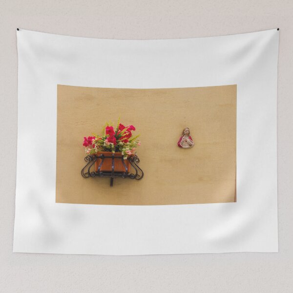 Item preview, Window Planter With Red Flowers Beside Small Sacred Heart Jesus Wall Plaque On Yellow Stucco designed and sold by Nmallia.