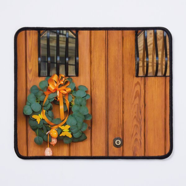 Item preview, Easter Wreath With Orange Ribbon On Rustic Wooden Door With Decorative Iron Grilles designed and sold by Nmallia.