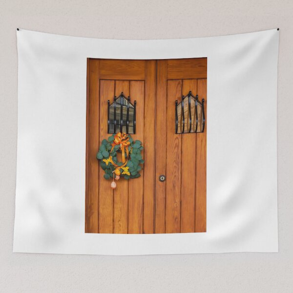 Item preview, Easter Wreath With Orange Ribbon On Rustic Wooden Door With Decorative Iron Grilles designed and sold by Nmallia.