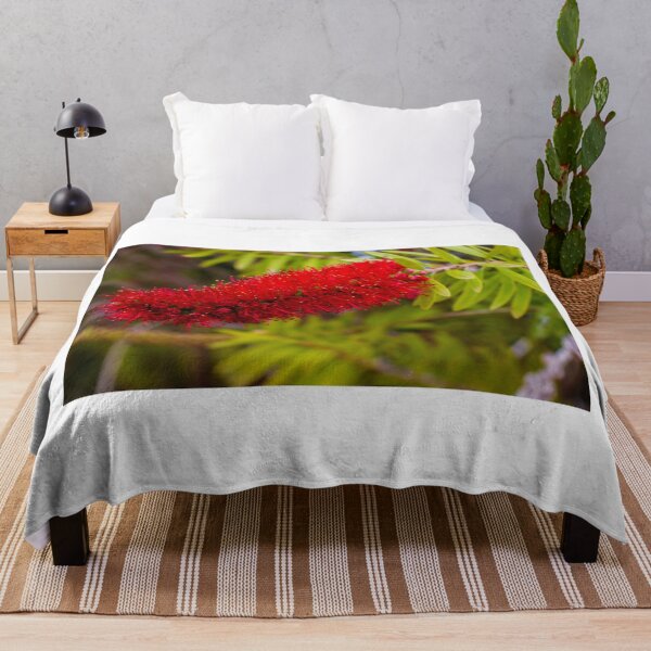 Item preview, Red Bottlebrush Flower Closeup On Green Leaves Vibrant Callistemon Bloom In Garden designed and sold by Nmallia.