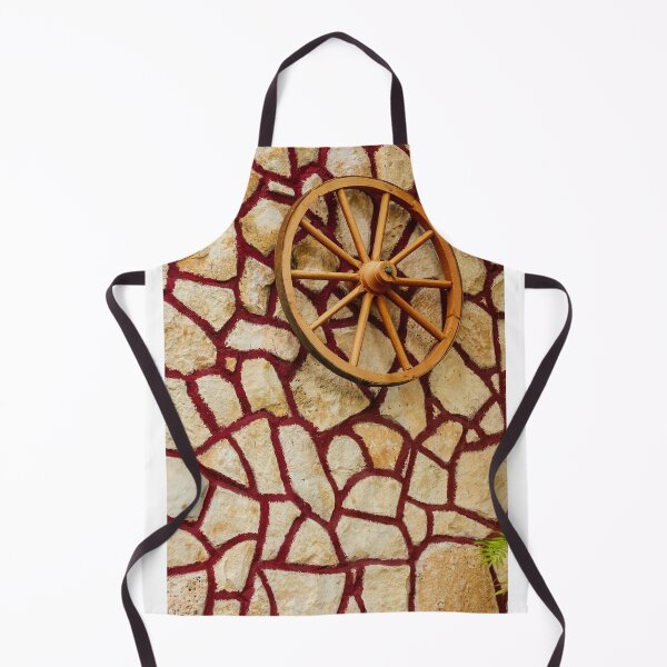 Item preview, Rustic Wagon Wheel Mounted on Textured Stone Wall With Red Grout Accent for Exterior Decor designed and sold by Nmallia.
