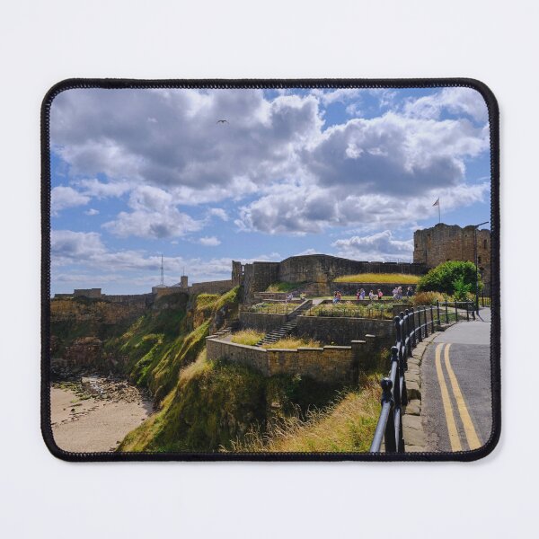 Item preview, Tynemouth Castle and King Edwards Bay under a blue sky with white clouds designed and sold by Violaman.