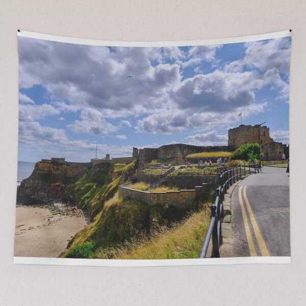 Item preview, Tynemouth Castle and King Edwards Bay under a blue sky with white clouds designed and sold by Violaman.