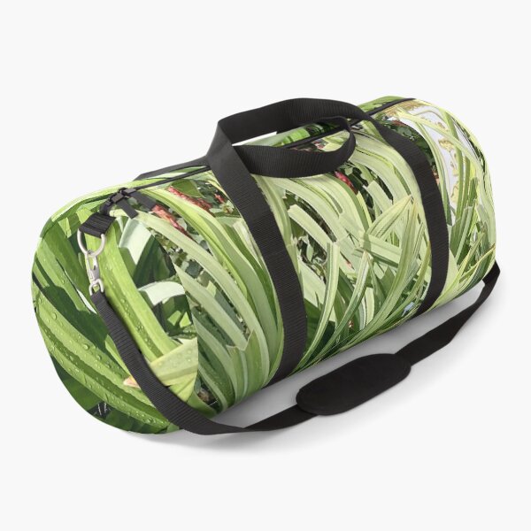 Item preview, Green tropical leaves with water droplets in the garden designed and sold by PhuongVoArt.