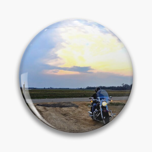 Item preview, Motorcyclist Approaching at Sunset designed and sold by The Unpromised Lens.