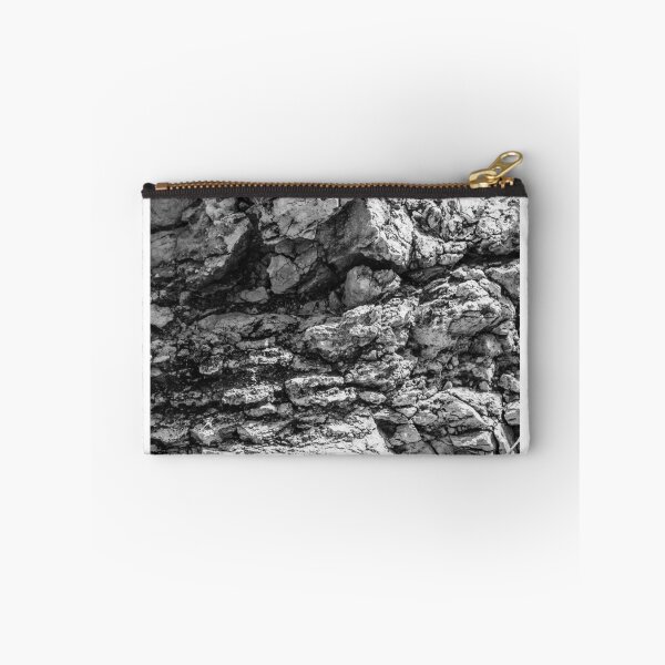 Item preview, Rugged Rock Texture Close-Up In Black And White Showing Layered Stone And Geological Detail designed and sold by Nmallia.