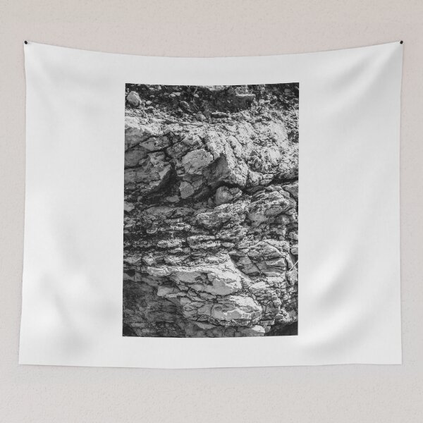 Item preview, Rugged Rock Texture Close-Up In Black And White Showing Layered Stone And Geological Detail designed and sold by Nmallia.