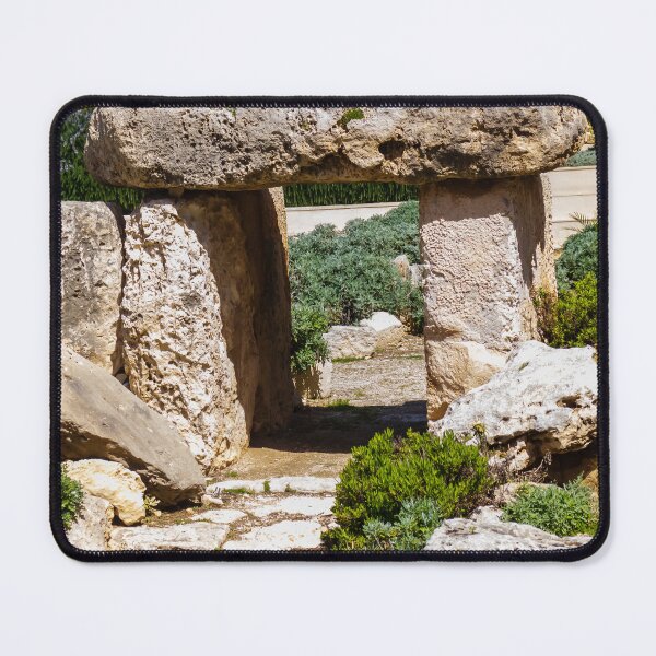 Item preview, Megalithic Stone Tomb Entrance Surrounded by Mediterranean Shrub Garden and Weathered Limestone Rocks designed and sold by Nmallia.