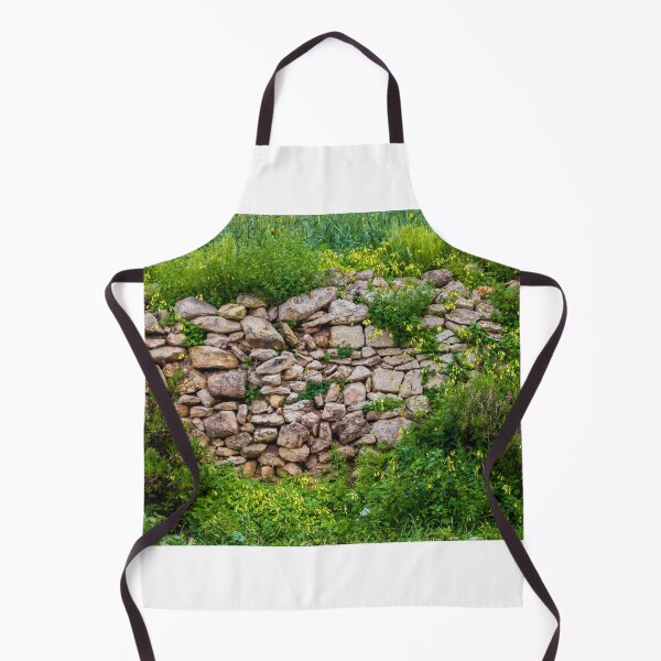Item preview, Old Dry Stone Wall Covered With Green Vines And Wildflowers In Lush Meadow designed and sold by Nmallia.