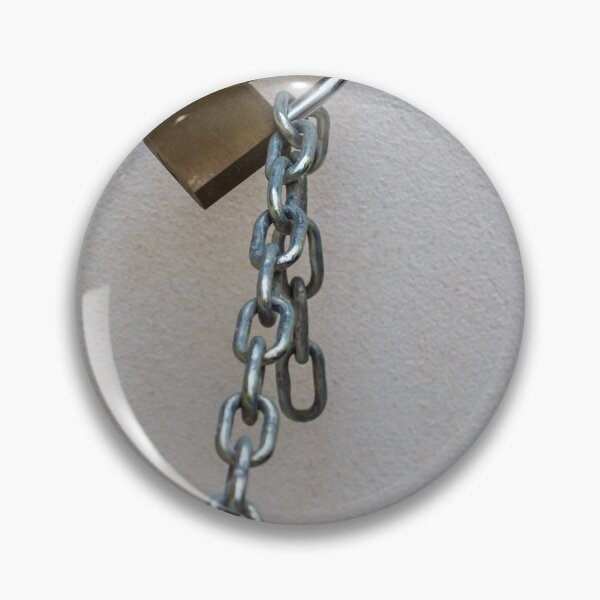 Item preview, Rusty Padlock And Hanging Chain Secured To Wall Representing Security And Restriction Concept designed and sold by Nmallia.