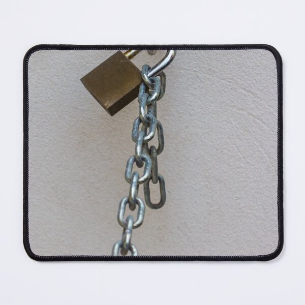 Item preview, Rusty Padlock And Hanging Chain Secured To Wall Representing Security And Restriction Concept designed and sold by Nmallia.