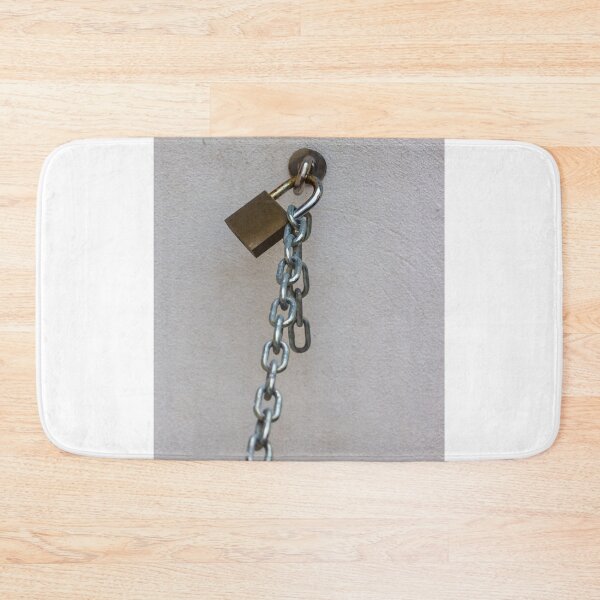 Item preview, Rusty Padlock And Hanging Chain Secured To Wall Representing Security And Restriction Concept designed and sold by Nmallia.