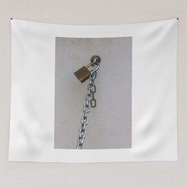 Item preview, Rusty Padlock And Hanging Chain Secured To Wall Representing Security And Restriction Concept designed and sold by Nmallia.