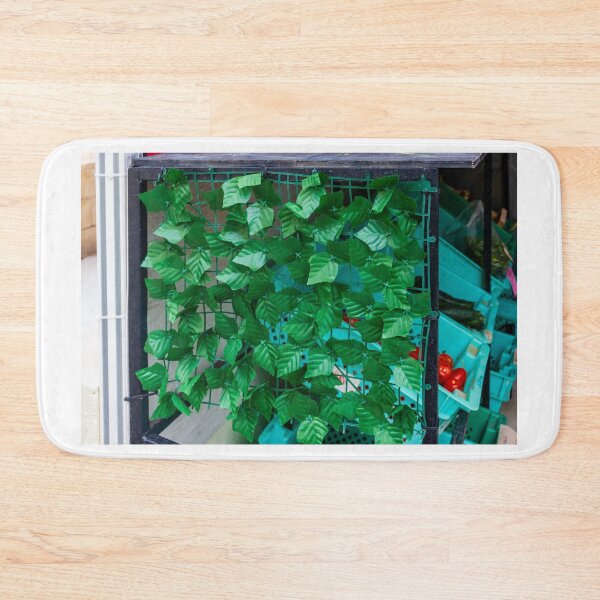Item preview, Artificial Green Leaf Privacy Screen Draped Over Market Crate Display With Turquoise Produce Bins And Tomatoes designed and sold by Nmallia.