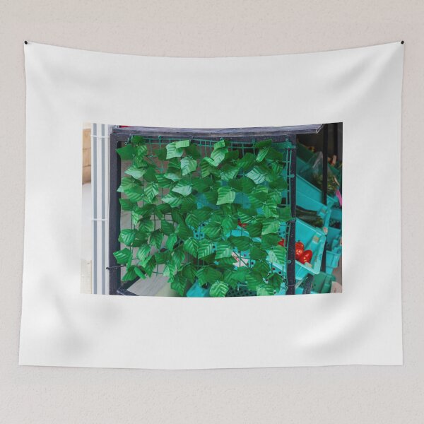 Item preview, Artificial Green Leaf Privacy Screen Draped Over Market Crate Display With Turquoise Produce Bins And Tomatoes designed and sold by Nmallia.