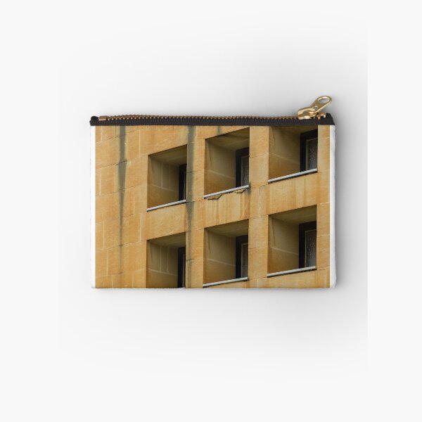 Item preview, Symmetrical Grid Of Square Windows On Weathered Sandstone Building Facade With Vertical Stains designed and sold by Nmallia.