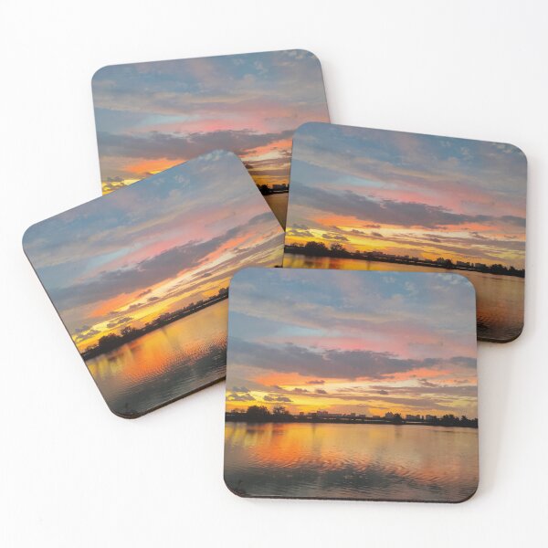Item preview, Shillhoute of trees and water body under Orange sky at evening  designed and sold by MagicMaker1984.