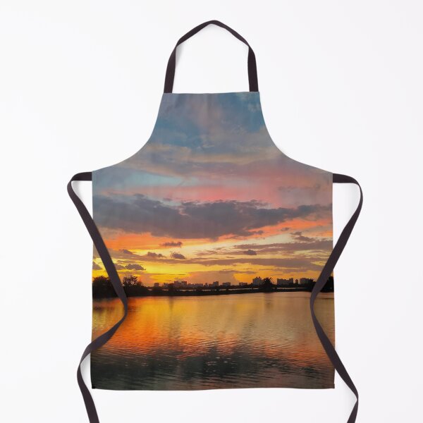 Item preview, Shillhoute of trees and water body under Orange sky at evening designed and sold by MagicMaker1984.