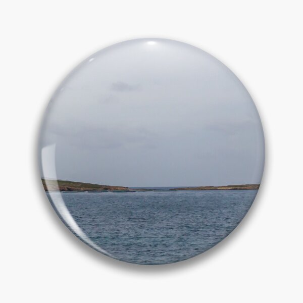 Item preview, Calm Ocean Seascape With Distant Island Lighthouse on Rocky Coastal Horizon Under Overcast Sky designed and sold by Nmallia.