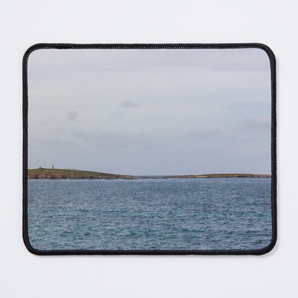 Item preview, Calm Ocean Seascape With Distant Island Lighthouse on Rocky Coastal Horizon Under Overcast Sky designed and sold by Nmallia.
