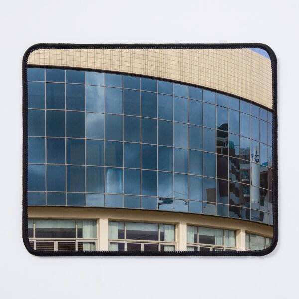 Item preview, Modern Curved Glass Building Facade With Reflective Windows and Contemporary Urban Architecture designed and sold by Nmallia.