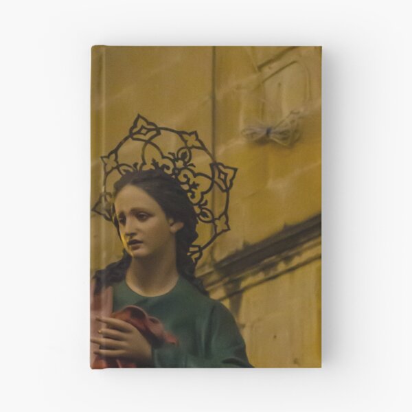 Item preview, Painted Statue of the Virgin Mary With Halo During Night Procession Near Stone Church Wall designed and sold by Nmallia.