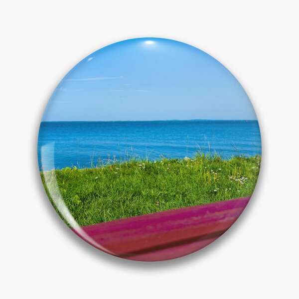 Item preview, Red bench in front of blue water designed and sold by GoldenWavesAndWilds.