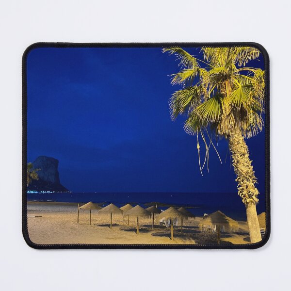 Item preview, Midnight Beach Paradise at Caple - Illuminated Palm Tree and Penon de Ifach Under Blue Hour Sky designed and sold by Astute-Artio-Photography.