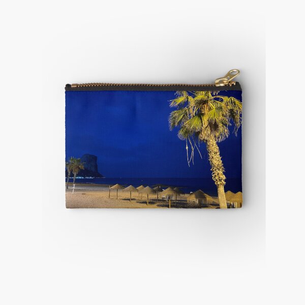 Item preview, Midnight Beach Paradise at Caple - Illuminated Palm Tree and Penon de Ifach Under Blue Hour Sky designed and sold by Astute-Artio-Photography.