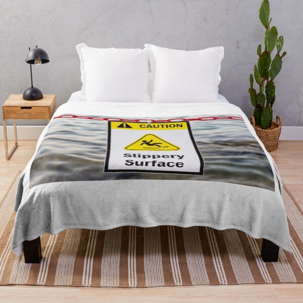 Item preview, Caution Slippery Surface Sign Hanging on Red Chain Over Water Near Dock or Shore designed and sold by Nmallia.