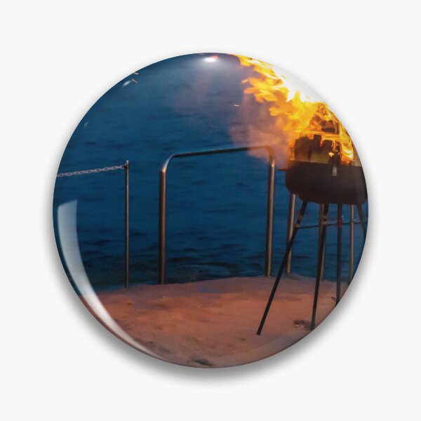 Item preview, Flaming Portable Grill On Rocky Beach At Night With Ocean Background And Sparks designed and sold by Nmallia.