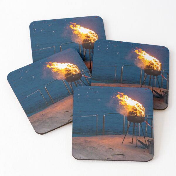 Item preview, Flaming Portable Grill On Rocky Beach At Night With Ocean Background And Sparks designed and sold by Nmallia.