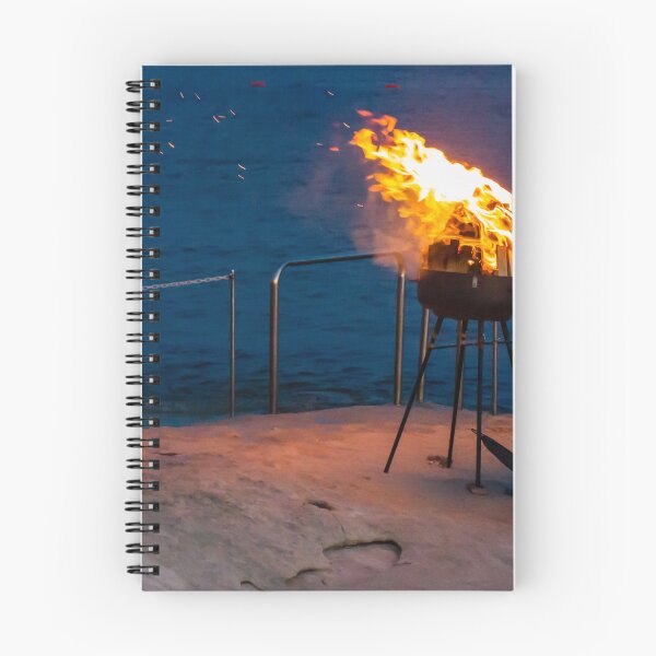 Item preview, Flaming Portable Grill On Rocky Beach At Night With Ocean Background And Sparks designed and sold by Nmallia.