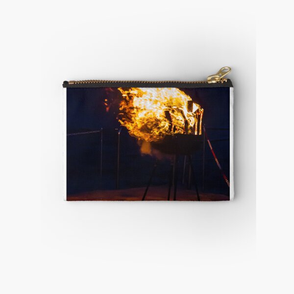 Item preview, Flaming Portable Grill On Rocky Beach At Night With Ocean Background And Sparks designed and sold by Nmallia.