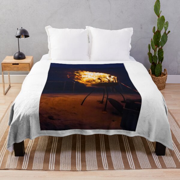 Item preview, Flaming Portable Grill On Rocky Beach At Night With Ocean Background And Sparks designed and sold by Nmallia.