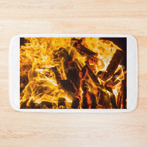 Item preview, Close-Up Of Intense Wood Fire Flames And Burning Logs In Hot Orange Bonfire designed and sold by Nmallia.