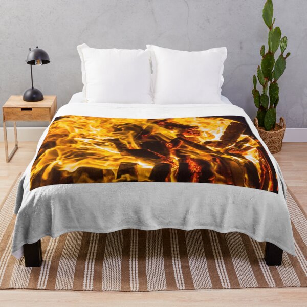 Item preview, Close-Up Of Intense Wood Fire Flames And Burning Logs In Hot Orange Bonfire designed and sold by Nmallia.