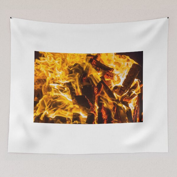 Item preview, Close-Up Of Intense Wood Fire Flames And Burning Logs In Hot Orange Bonfire designed and sold by Nmallia.