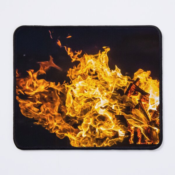 Item preview, Close-Up Of Intense Wood Fire Flames And Burning Logs In Hot Orange Bonfire designed and sold by Nmallia.