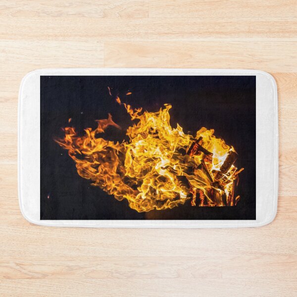 Item preview, Close-Up Of Intense Wood Fire Flames And Burning Logs In Hot Orange Bonfire designed and sold by Nmallia.