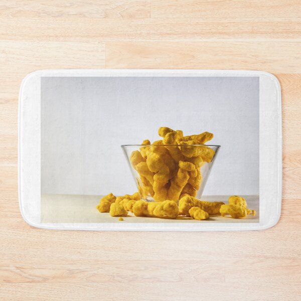Item preview, Crunchy Cheese Puffs In Glass Bowl On White Background - Cheesy Snack Food For Munching designed and sold by Nmallia.