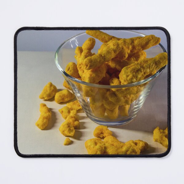 Item preview, Cheesy Corn Puffs Snack In Glass Bowl With Scattered Pieces On White Background designed and sold by Nmallia.