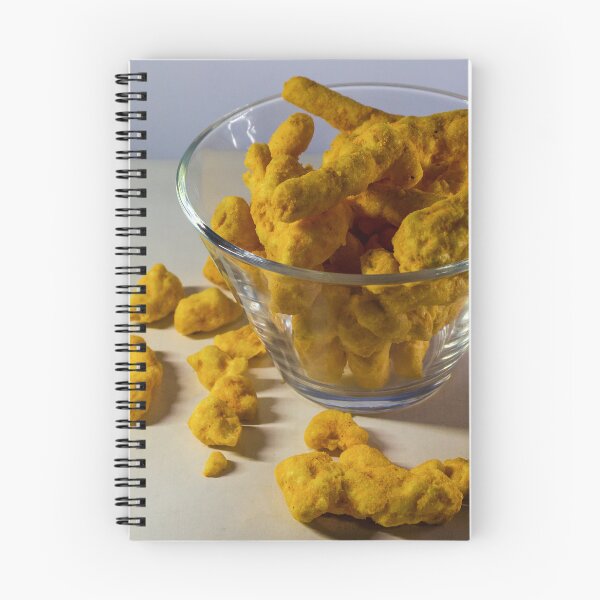 Item preview, Cheesy Corn Puffs Snack In Glass Bowl With Scattered Pieces On White Background designed and sold by Nmallia.