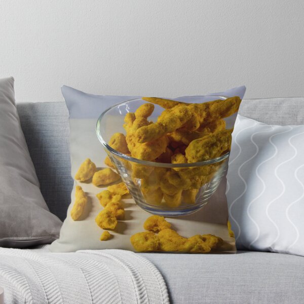 Item preview, Cheesy Corn Puffs Snack In Glass Bowl With Scattered Pieces On White Background designed and sold by Nmallia.