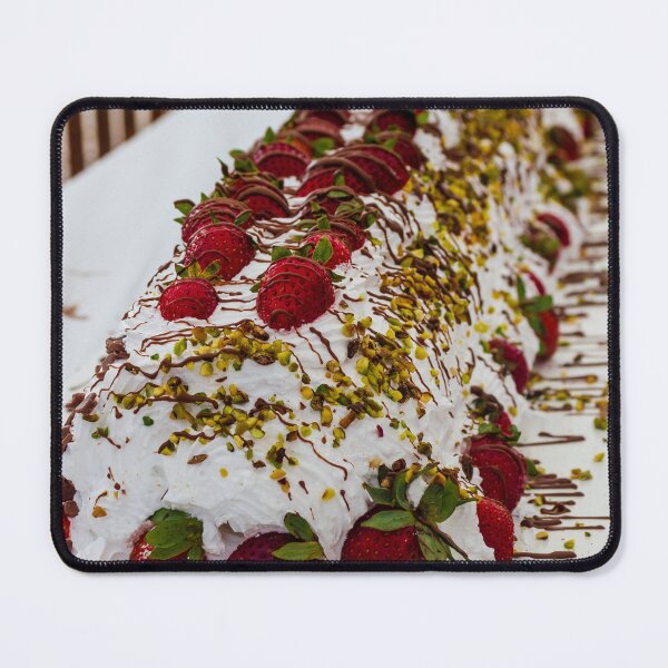Item preview, Long Strawberry Whipped Cream Cake Drizzled With Chocolate And Pistachios On Serving Board designed and sold by Nmallia.