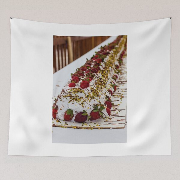 Item preview, Long Strawberry Whipped Cream Cake Drizzled With Chocolate And Pistachios On Serving Board designed and sold by Nmallia.