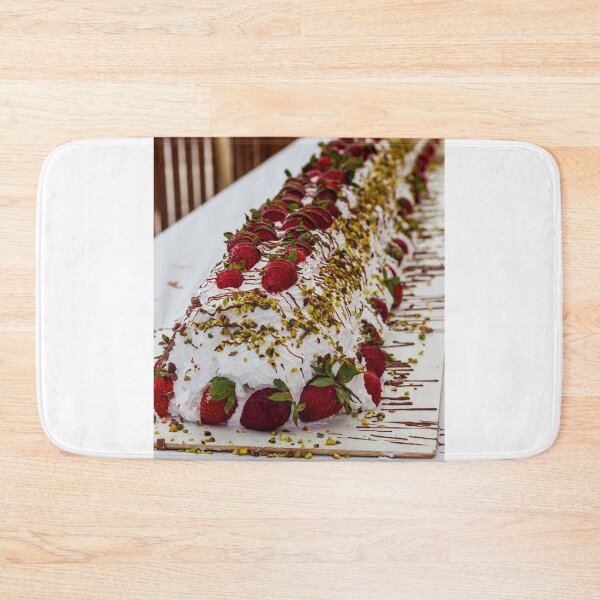 Item preview, Long Strawberry Whipped Cream Cake Drizzled With Chocolate And Pistachios On Serving Board designed and sold by Nmallia.