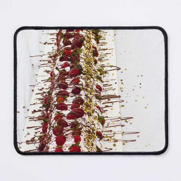 Item preview, Long Strawberry Whipped Cream Cake Drizzled With Chocolate And Pistachios On Serving Board designed and sold by Nmallia.