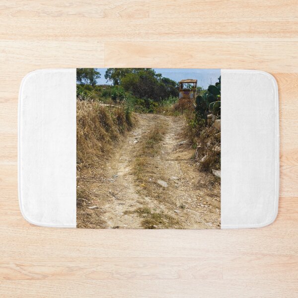 Item preview, Rural Dirt Road Leading Through Dry Field Toward Abandoned Tractor And Mediterranean Shrubland designed and sold by Nmallia.